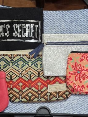 Cinda B Multicolor Geometric Cosmetic Pouch with Coral Floral Accent